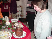 Laurie Bauml eyes her cake.