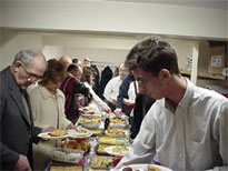 Members of the church get food.
