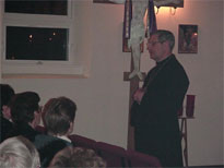 Father Andrew talks to those attending.