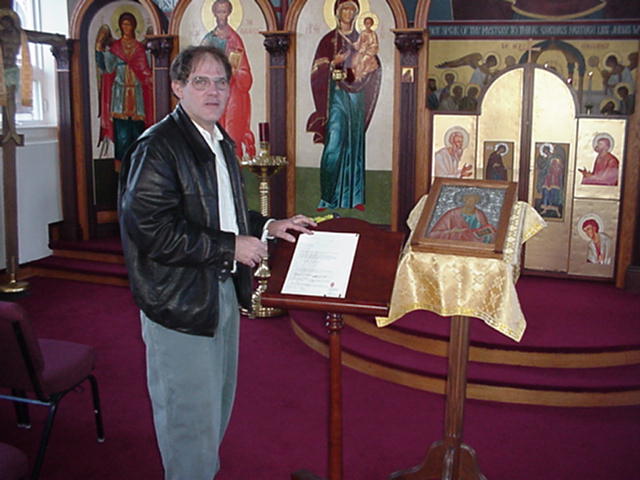 Michael Bauml signing the contract.