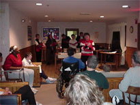 The choir sings for the residents.