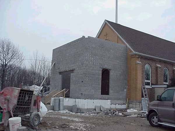 Cinder Blocks define the new entrance for the Church.