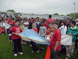 Carrying the St. Luke Banner.