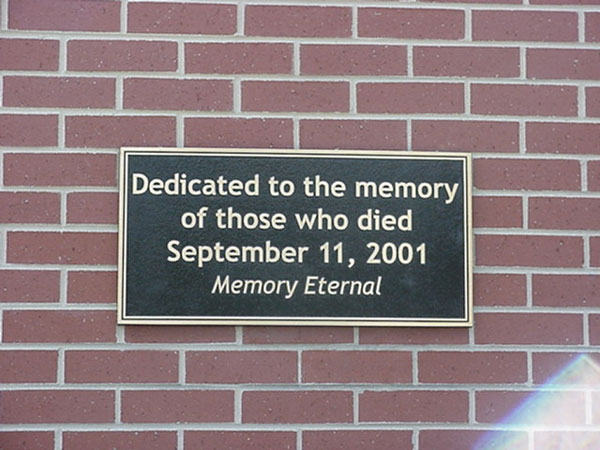 Plaque dedicating the belltower to those who perished on 9-11.