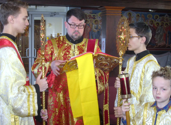 Scene from Liturgy Of St. Basil and St. Basil's Bread (Vasilopita).