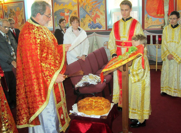 Scene from Liturgy Of St. Basil and St. Basil's Bread (Vasilopita).